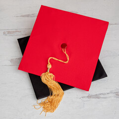 Red Graduation Cap With Gold Tassel