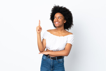 Young African American woman isolated on white background pointing up a great idea