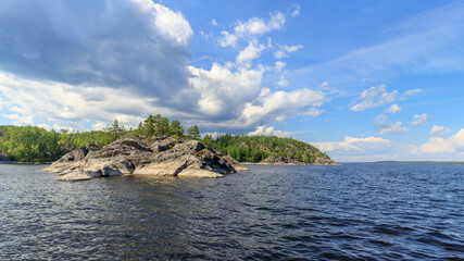 One of the islands of lake Ladoga. The photo was taken during a boat ride on an summer day.