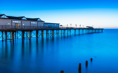 Blue Hour in long time exposure of Grand Pier in Teignmouth, Devon, England, Europe