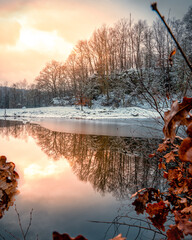 Sunset at the frozen lake
