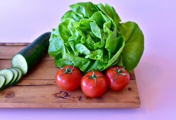 Healthy fresh organic salad ingredients of homegrown or farmer's market produce for heart healthy meals. Photo concept, food background, copy space