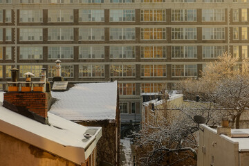 Rooftops in the city of Philadelphia during a fresh snow fall