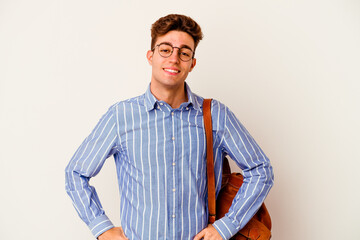 Young student man isolated on white background confident keeping hands on hips.