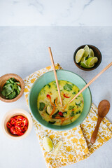 thai coconut soup with garnishes