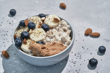 Breakfast: oatmeal with bananas, blueberries, chia seeds and almonds