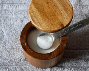 Top view of a teaspoon of salt