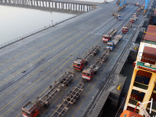 India, Mumbai Port Trust - 25 January, 2017: View to the goods carriers trucks in the port. Port...