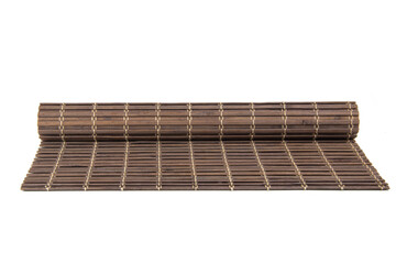 Rolled bamboo mat for food dark color isolated on the white background