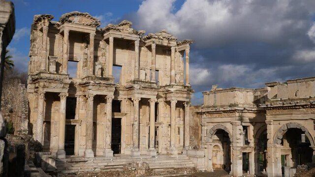 View of the decorative facade of the Library of Celsus and the Gate of Augustus in Ephesus. High quality 4k footage