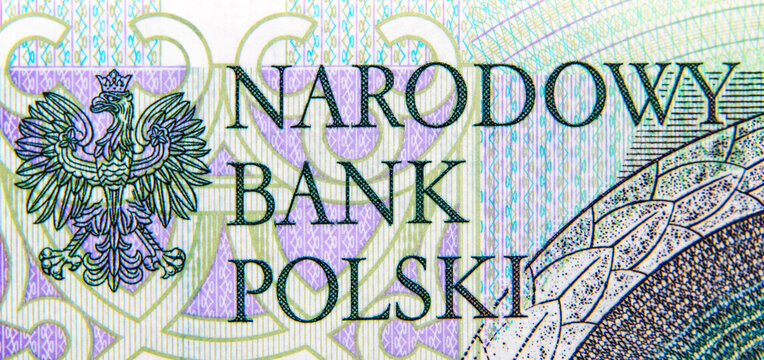 Polish National Bank sign on one hundred zloty banknote. Macro shot.