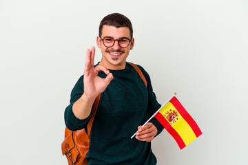 Young caucasian man studying English isolated on white background cheerful and confident showing ok...