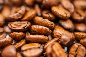 
Macro shot of brown freshly roasted coffee beans