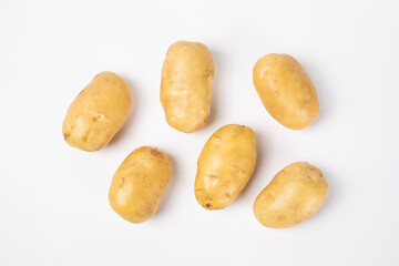 Fresh raw potatoes isolated on white background
