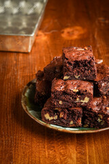 Brownies with walnuts on a plate