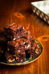 Brownies with walnuts on a plate