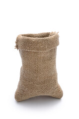 Empty coarse cloth sack isolated on white background