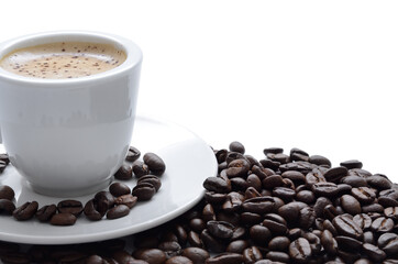 Aromatic coffee in a cup, coffee beans isolated on white.