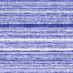 Denim blue white tonal wave stripe linen texture. Seamless textile effect background. Weathered indigo dye pattern. Modern coastal cottage decor. Rustic washed out wavy striped fabric material tile.
