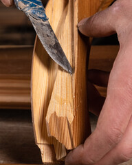 restoration of wooden surfaces, the master cleans and prepares the wood