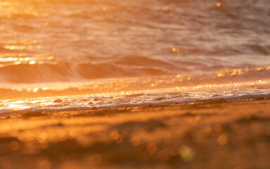 The shine of a sunset on the beach.