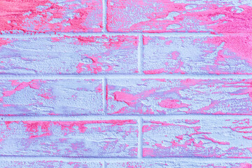 Pink or purple and light blue abstract paint pattern surface brick wall texture background