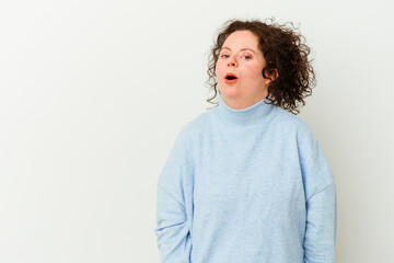 Woman with Down syndrome isolated being shocked because of something she has seen.