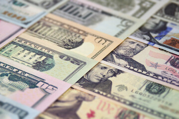 Macro close up view of Several USA Dollar banknotes bills.