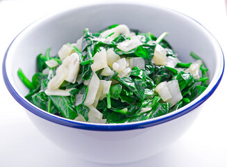 spinach with garlic in a bowl