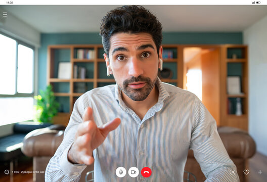 Business man on a work video call from home.