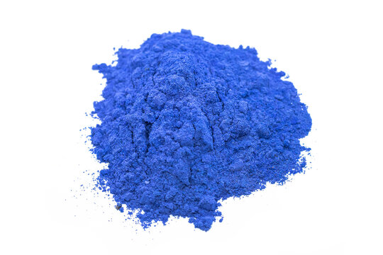 Piles Of Blue Color Powder For Indian Holi Festival On White Background.