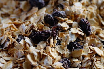 Oatmeal with raisins, cinnamon and milk. Food for athletes, vegetarians and dieters.