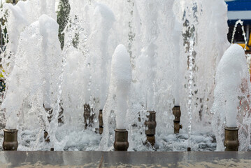 Water flow from the pipes of the fountain, pool pipe waste water, sponge small fountain, oxygenated water pipe.