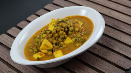 A Indian dish of peas and soft, immature, cheese, classic North Indian Dish 