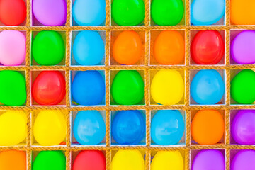 Multicolored bright balloons background for playing darts game