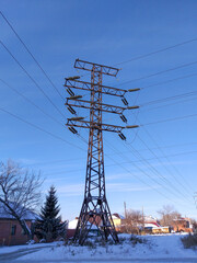 High voltage tower pylons with nice sky background
