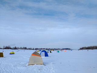Winter fishing on the Irtysh River of the Omsk city.
