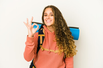 Young caucasian woman ready for a trip isolated cheerful and confident showing ok gesture.