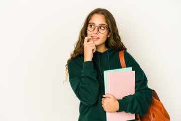 Fototapeta premium Young caucasian student woman isolated relaxed thinking about something looking at a copy space.