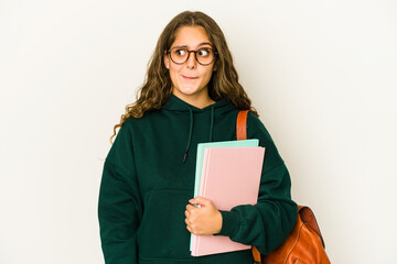 Fototapeta premium Young caucasian student woman isolated confused, feels doubtful and unsure.