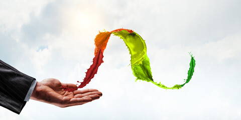 Explosion of colored powder . Mixed media