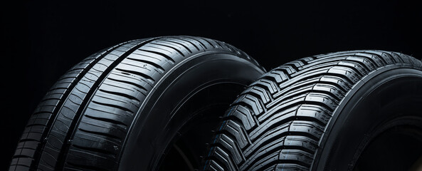 a pair of summer tires, side view, panorama close-up