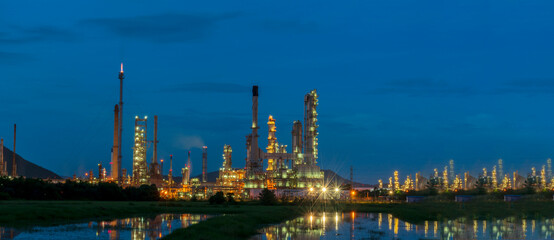 Obraz na płótnie Canvas Oil refinery gas petrol plant industry with crude tank, gasoline supply and chemical factory. Petroleum barrel fuel heavy industry oil refinery manufacturing factory plant. Refinery industry concept