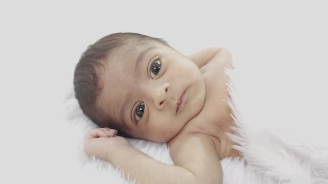 New Born Baby Girl playing in summer morning