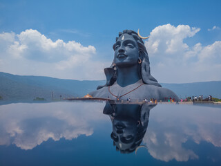COIMBATORE , INDIA - March 20, 2021: Reflection of Adiyogi Shiva Statue - People Are Visiting And...