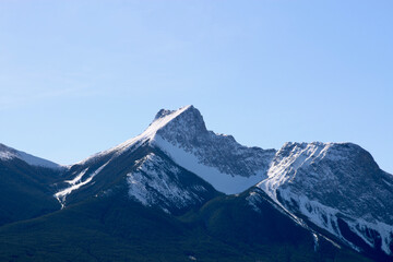 Naklejka na ściany i meble Close up snowy mountain peak