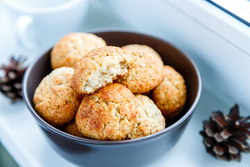 Freshly baked Anzac biscuits. Traditional homemade dessert close-up