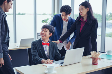 The LGBTQ business team stands in applause to congratulate their colleagues on the success of the event. The LGBTQ business team concept, celebrating Asian ethnic success.