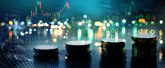 money coin and blur green blue city light and index number of stock market business abstract banner...