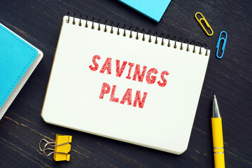 Financial concept meaning SAVINGS PLAN with phrase on the page. An employer-provided tax-deferred account typically used to save for retirement